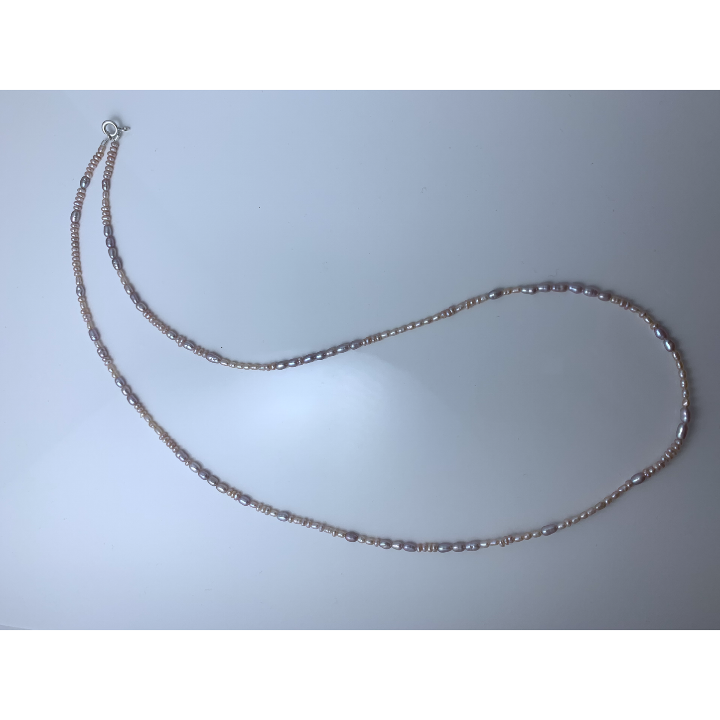 Long seed pearl necklace duo